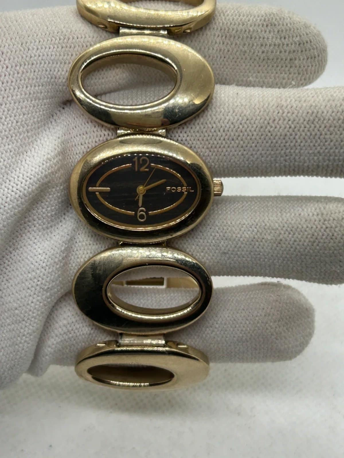 Ladies Fossil gold oval bracelet style watch