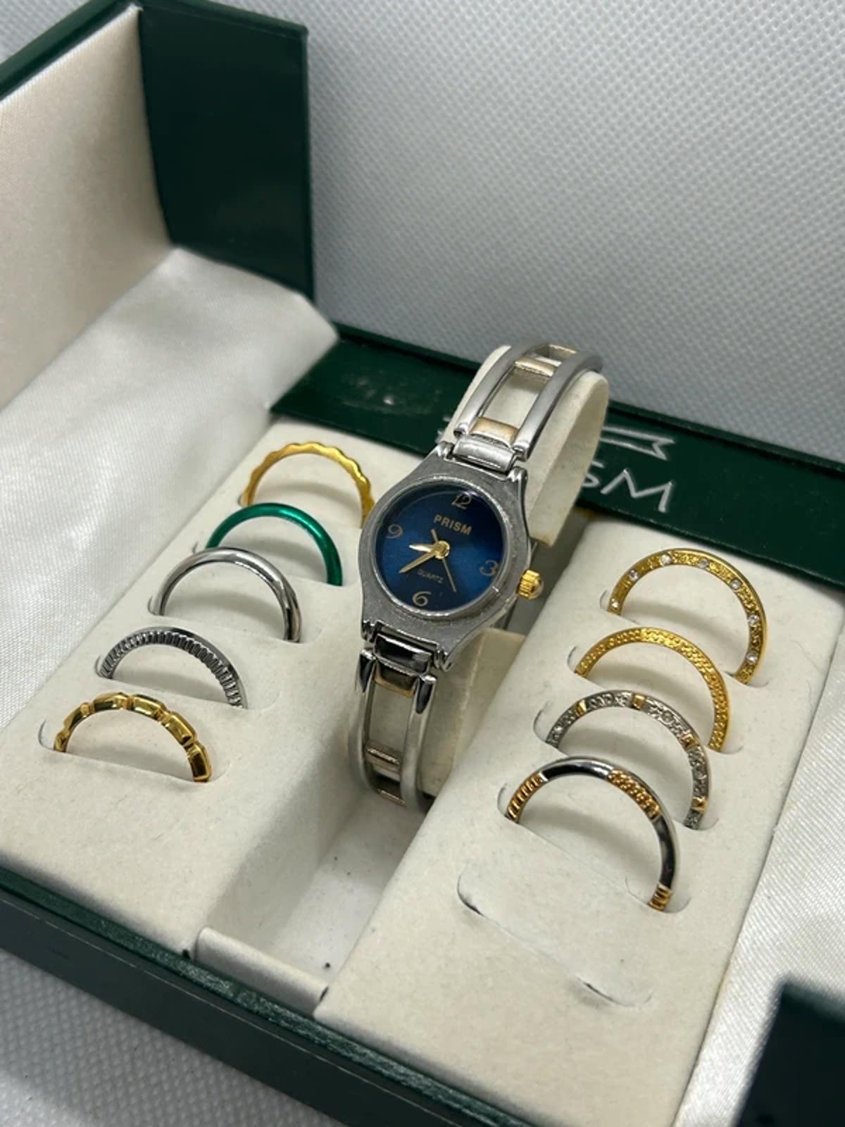Ladies gold and silver Prism watch changeable bezel watch with box