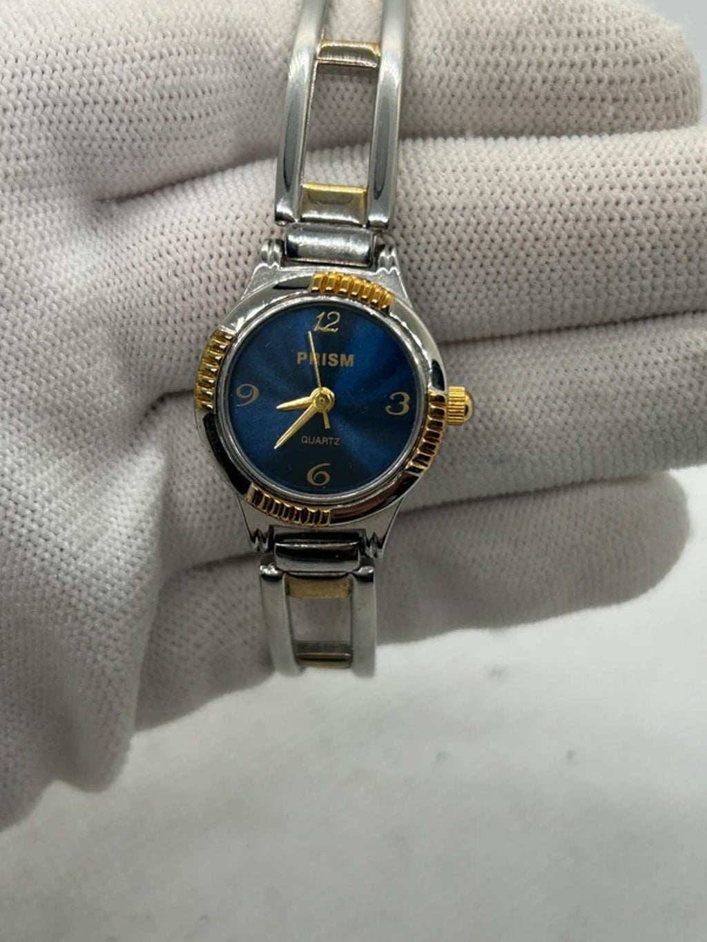 Ladies gold and silver Prism watch changeable bezel watch with box
