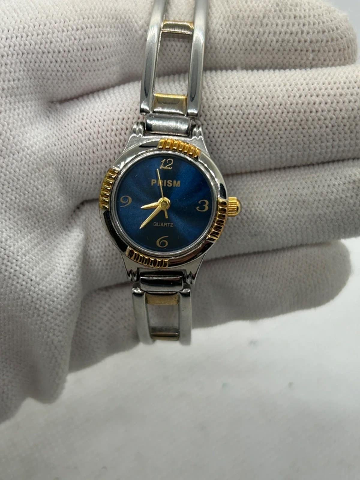 Ladies gold and silver Prism watch changeable bezel watch with box