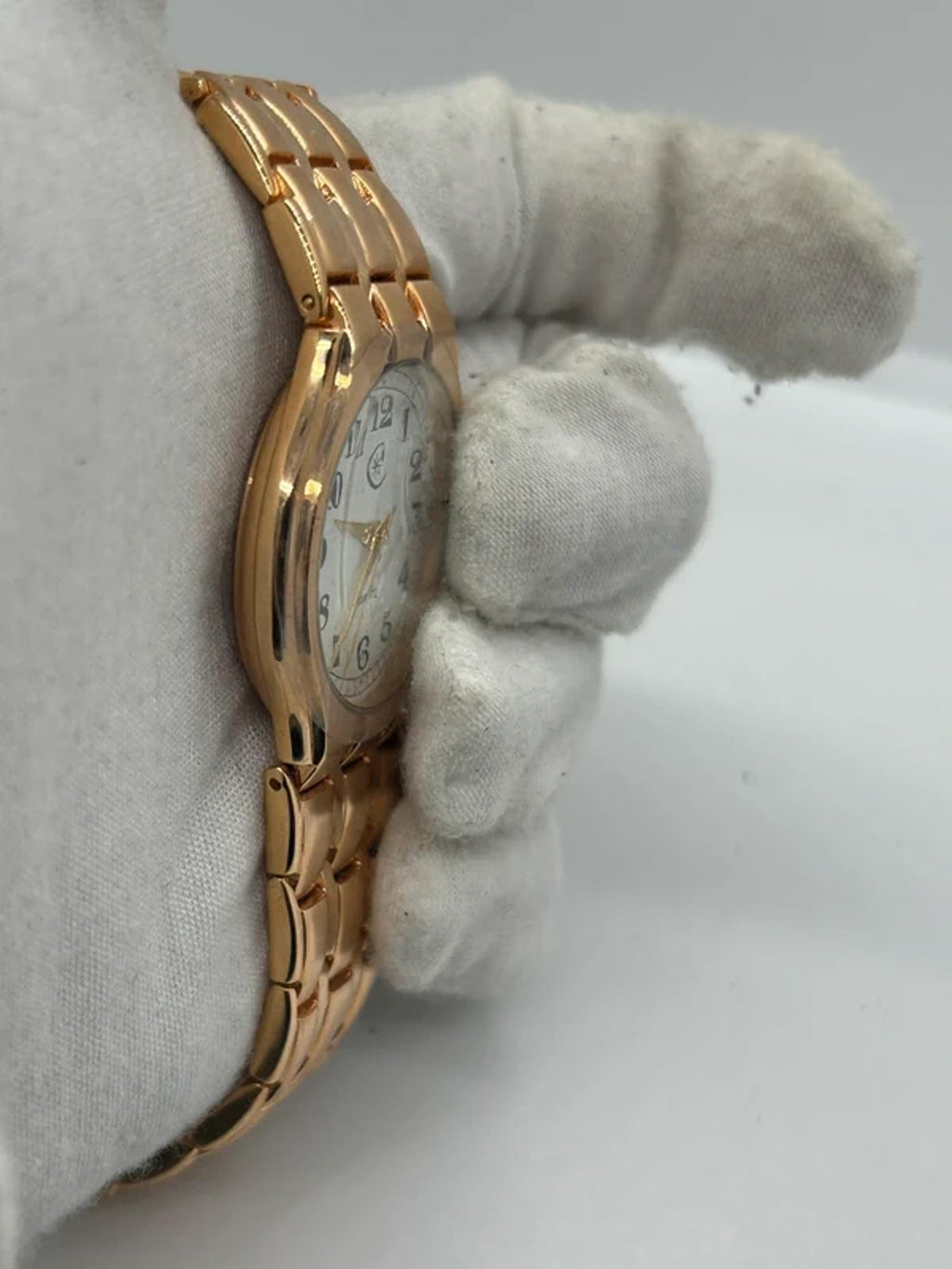 Ladies Copperfield gold case watch and bracket with white dial