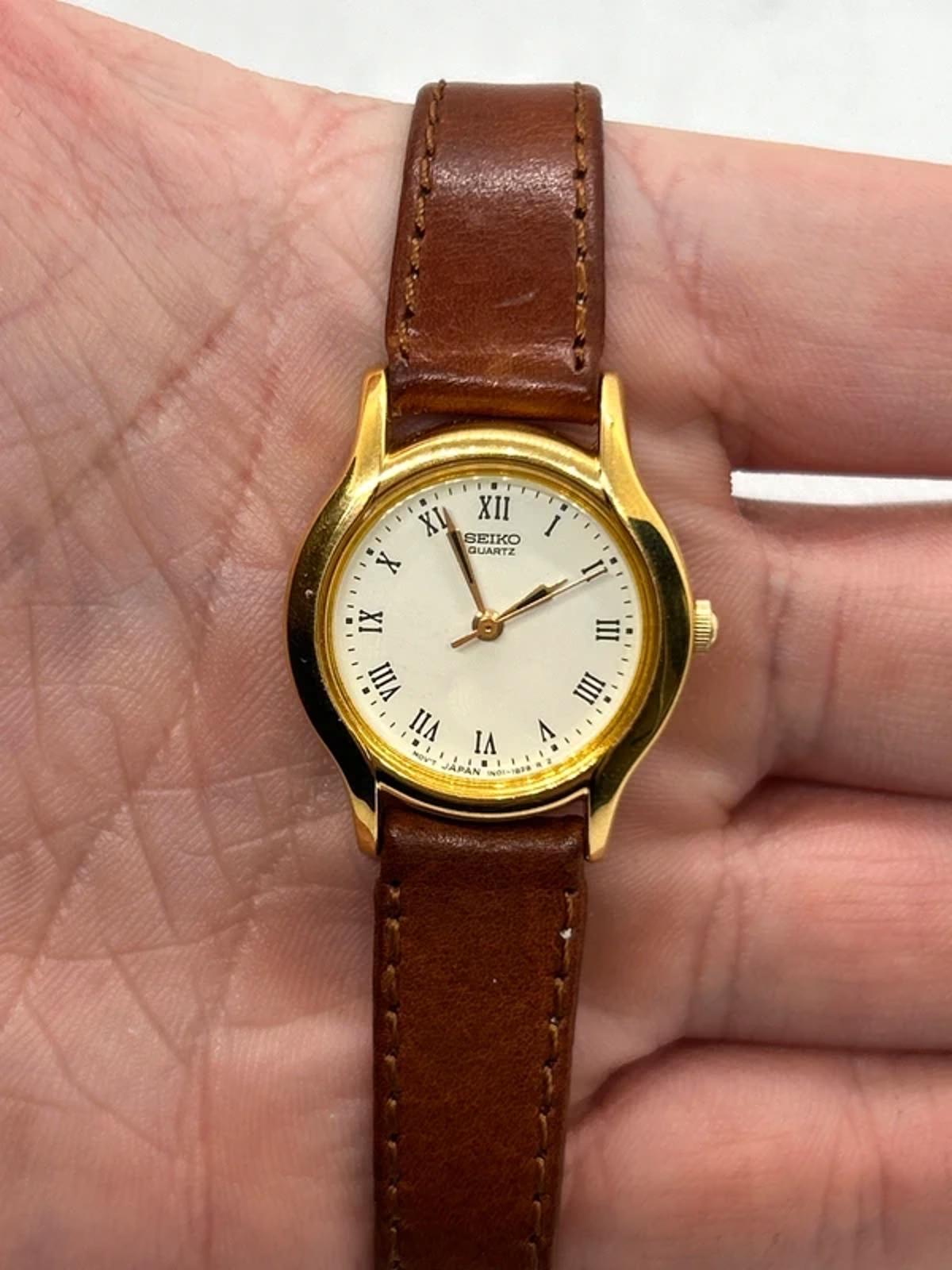Ladies gold Seiko dress watch with brown leather strap and box