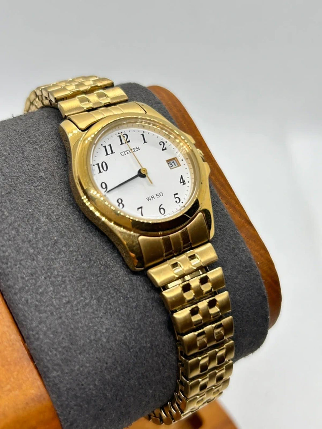 Ladies gold Citizen Watch stretch gold bracelet with white dial