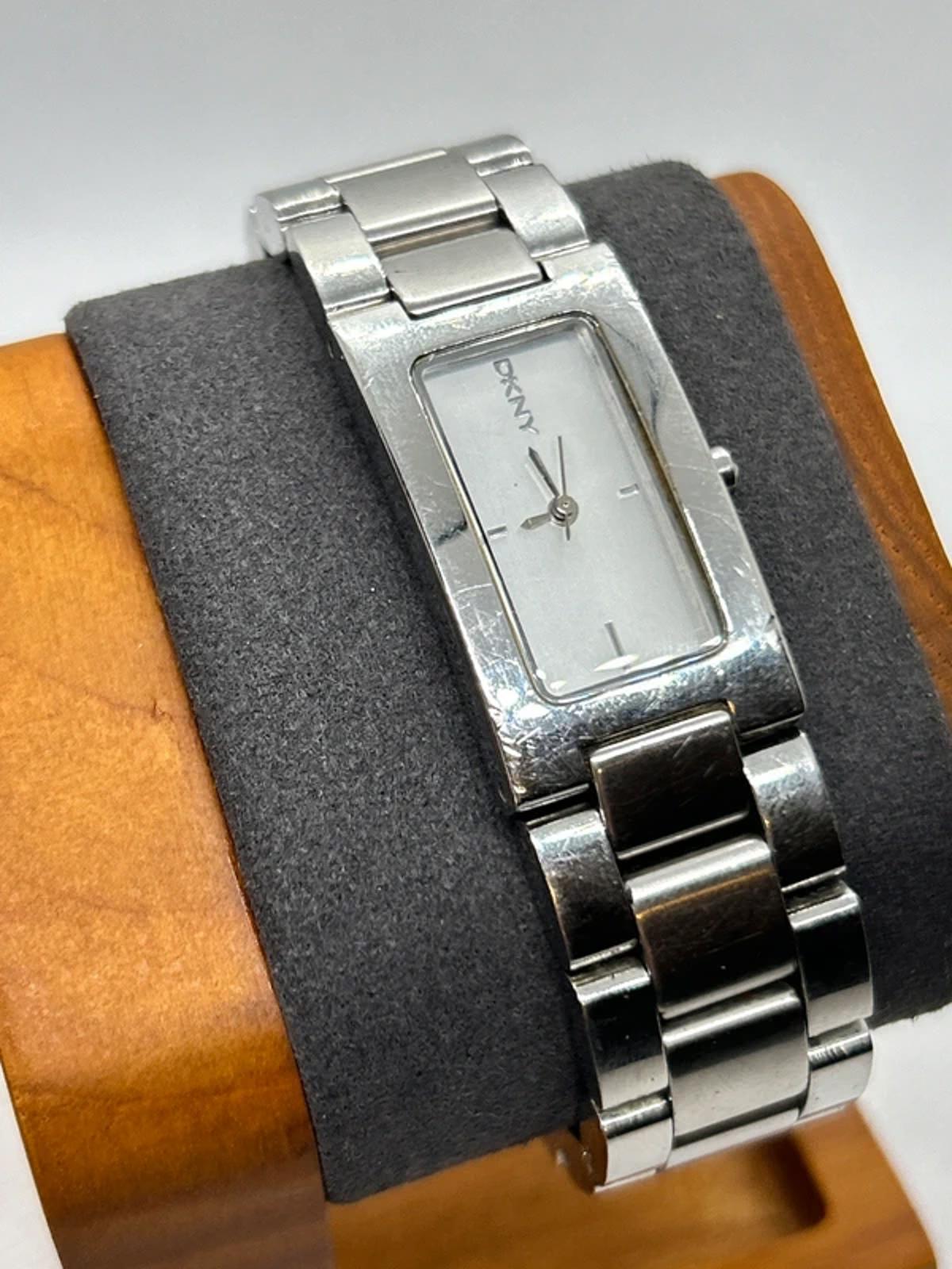 Ladies DKNY slim size silver watch with white dial and silver bracelet