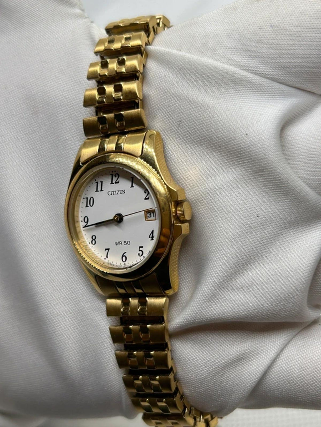 Ladies gold Citizen Watch stretch gold bracelet with white dial
