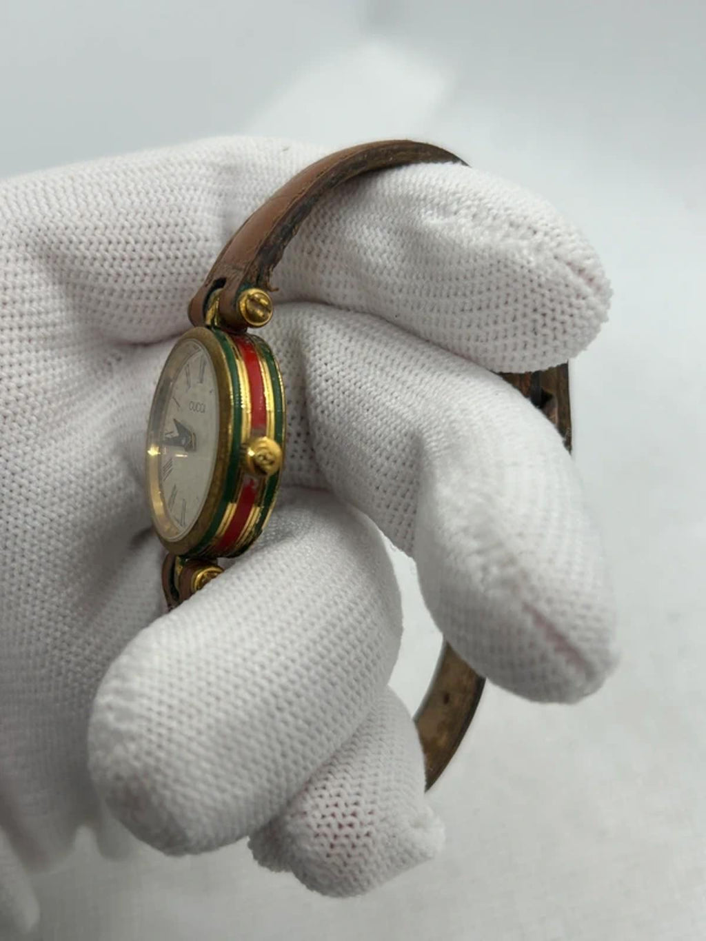 Vintage Gucci ladies watch with gold dial and red green case watch