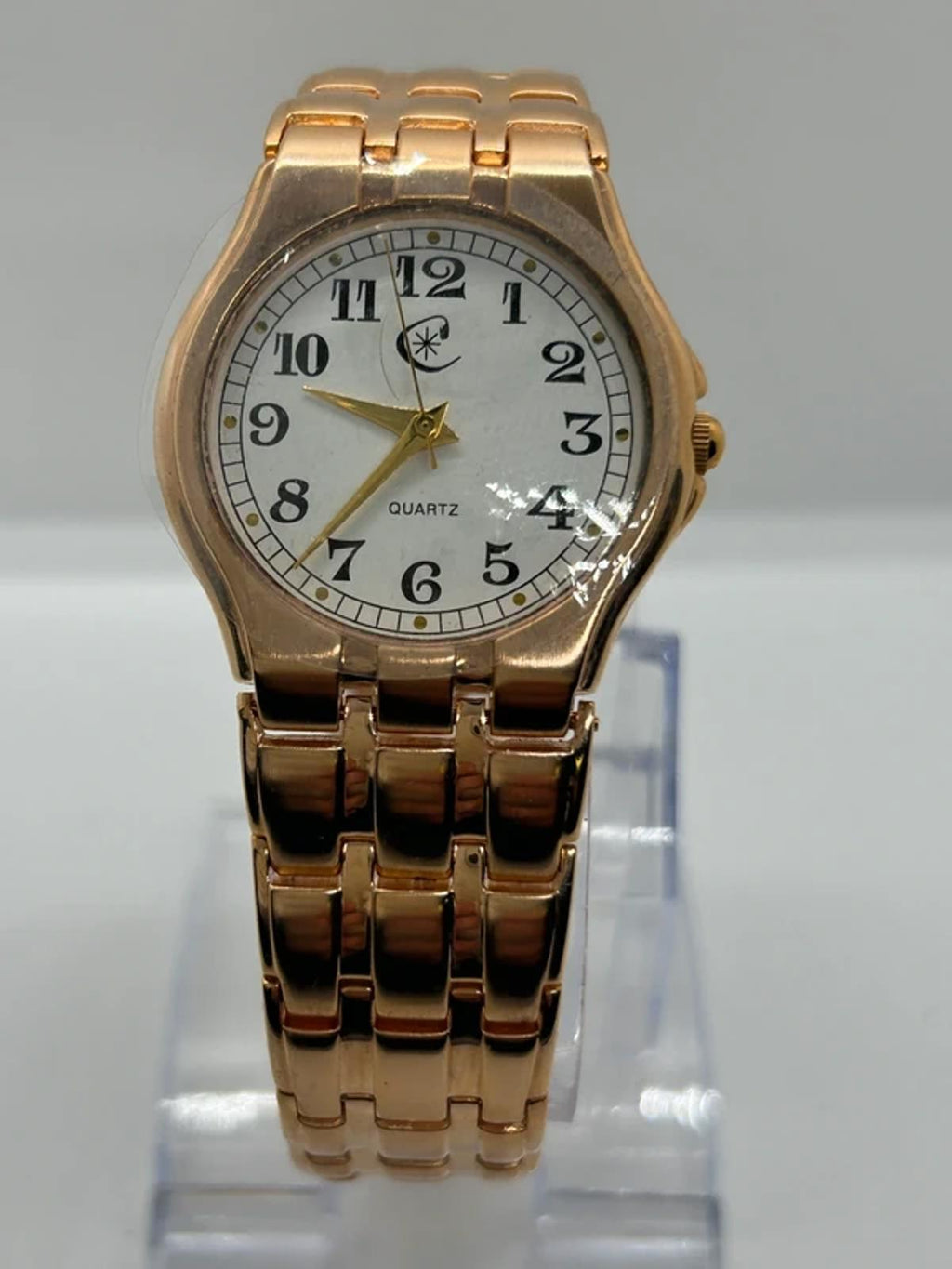 Ladies Copperfield gold case watch and bracket with white dial