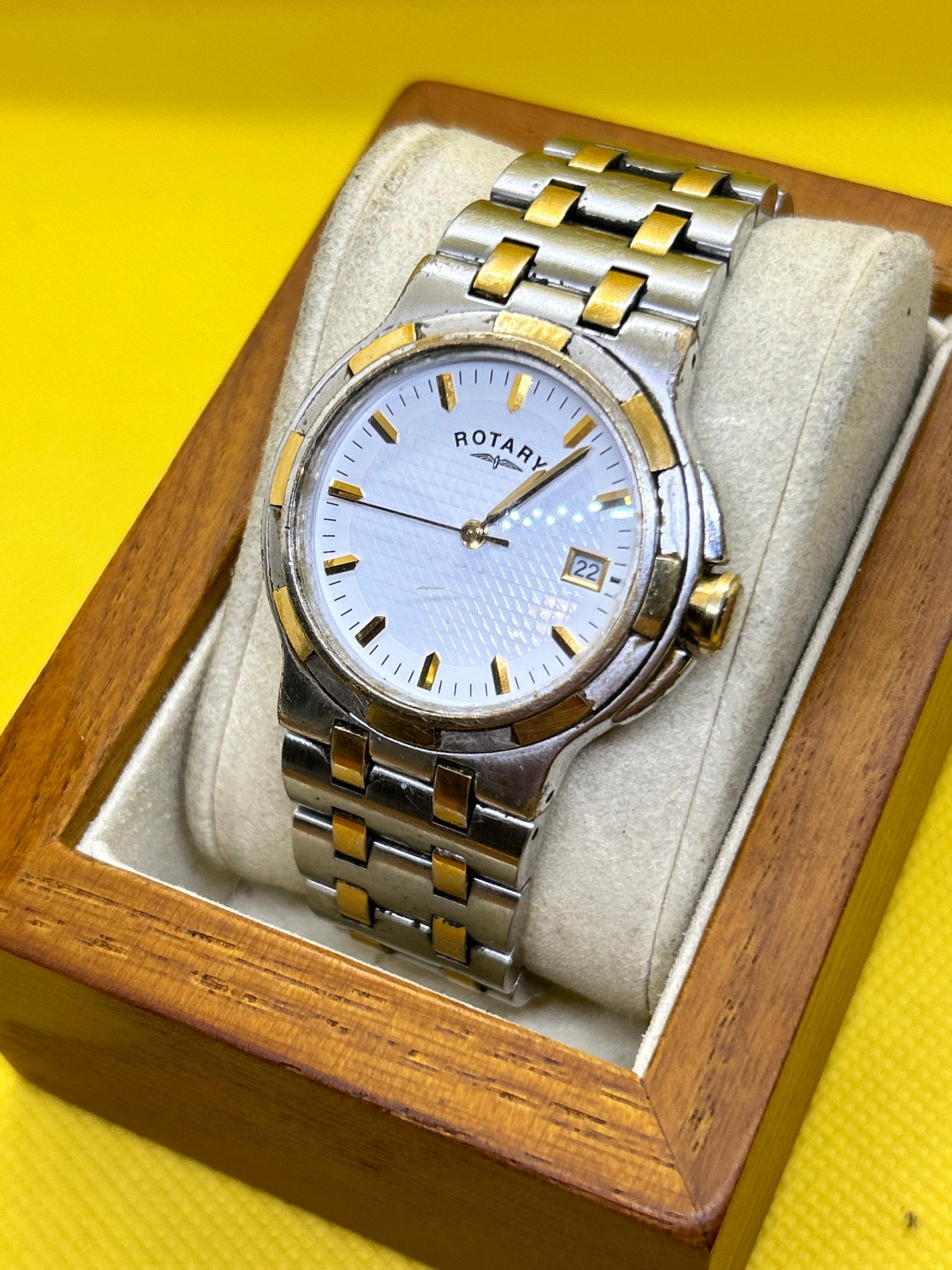 Rotary quartz two tone silver and gold watch with date function