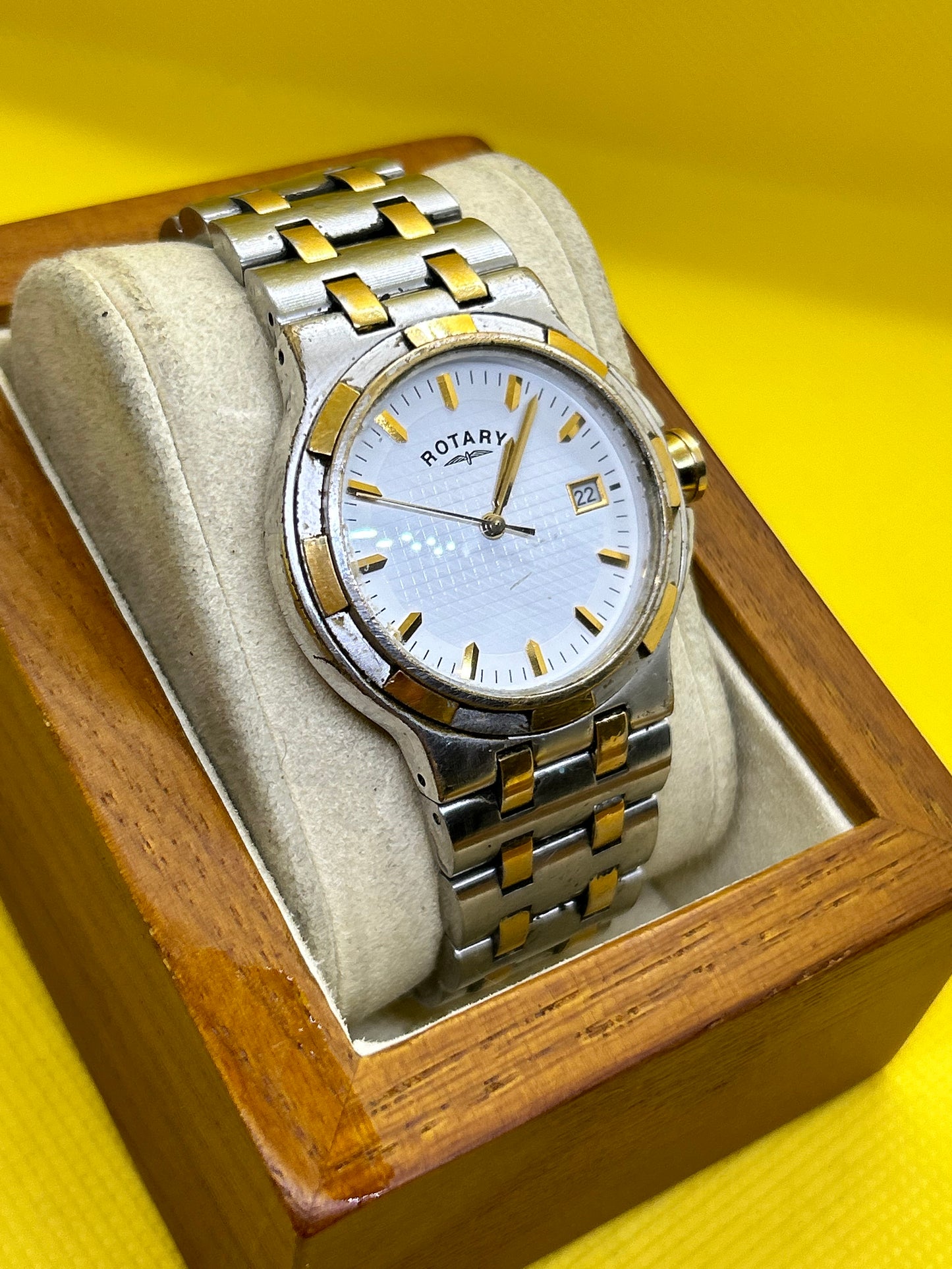 Rotary quartz two tone silver and gold watch with date function