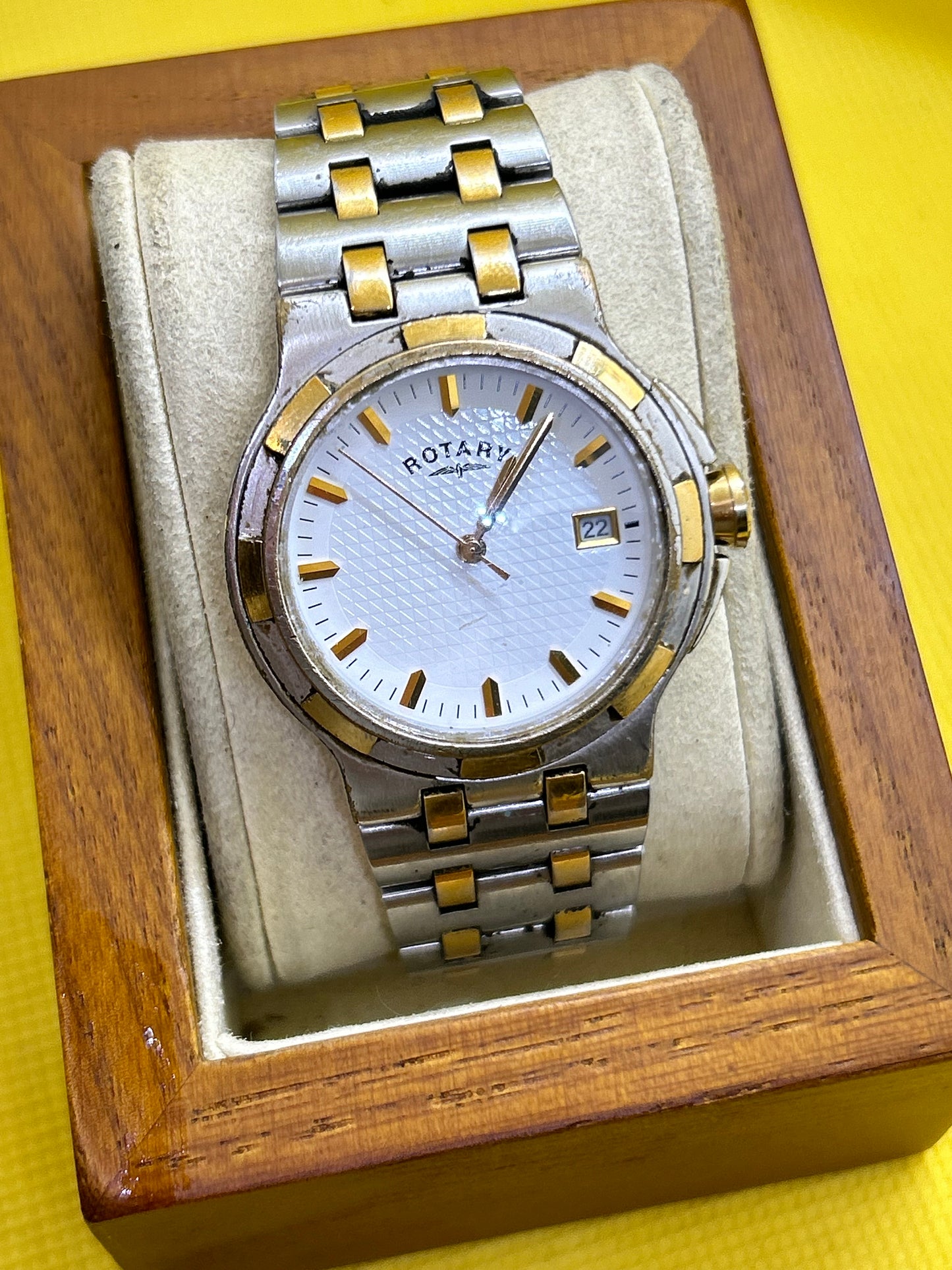 Rotary quartz two tone silver and gold watch with date function