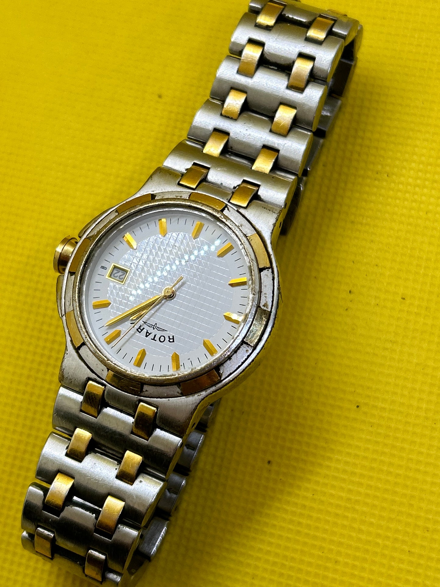 Rotary quartz two tone silver and gold watch with date function