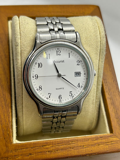 Accurist watch with date function silver case and bracelet