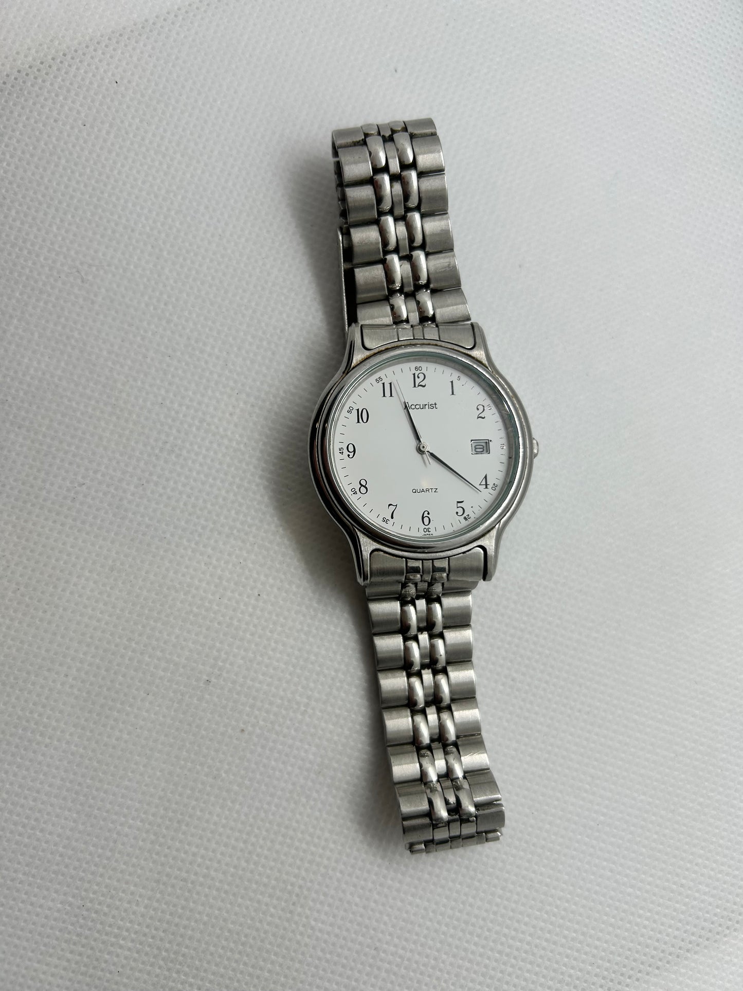 Accurist watch with date function silver case and bracelet