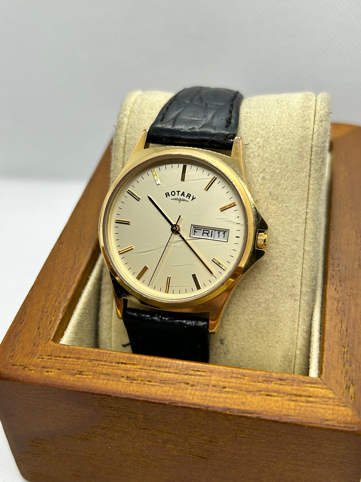 Rotary watch gold dial with day date function