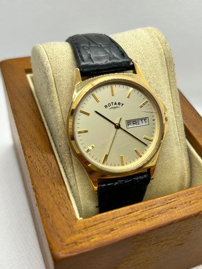 Rotary watch gold dial with day date function