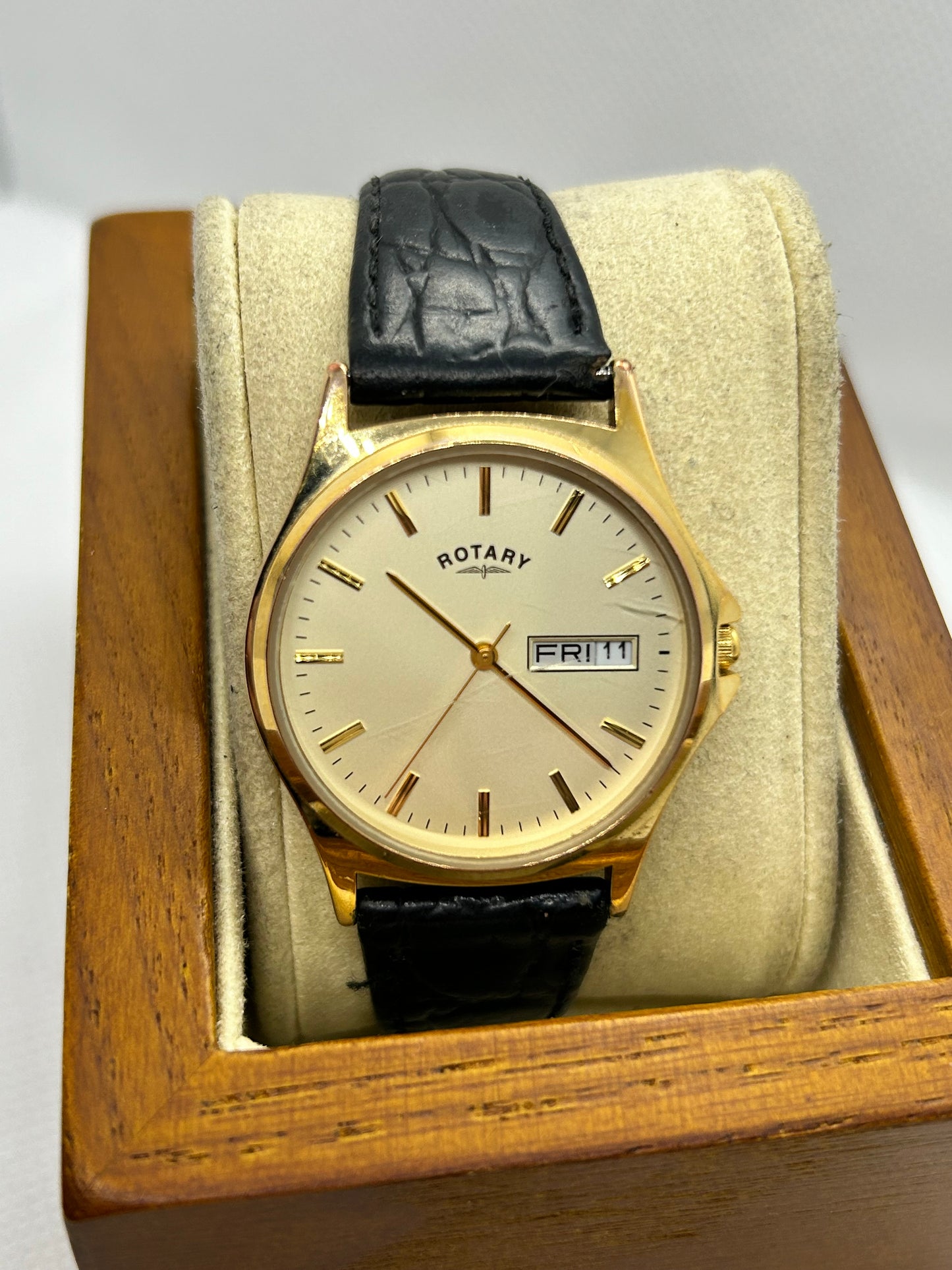 Rotary watch gold dial with day date function