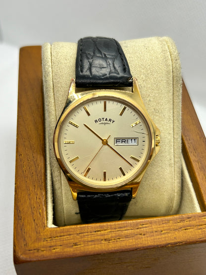 Rotary watch gold dial with day date function