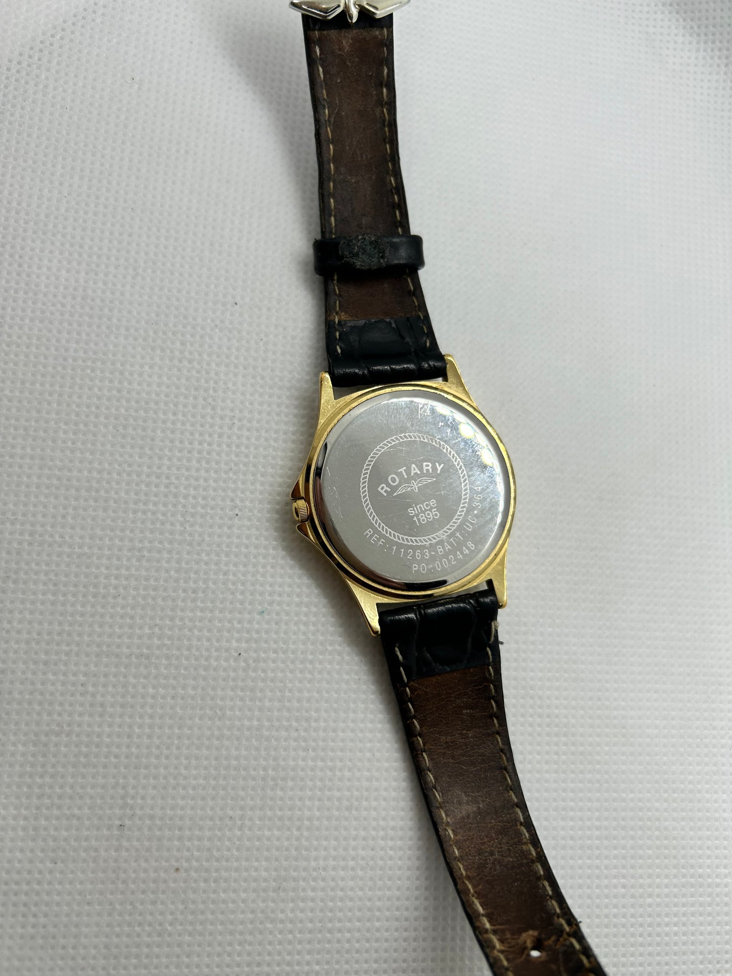 Rotary watch gold dial with day date function