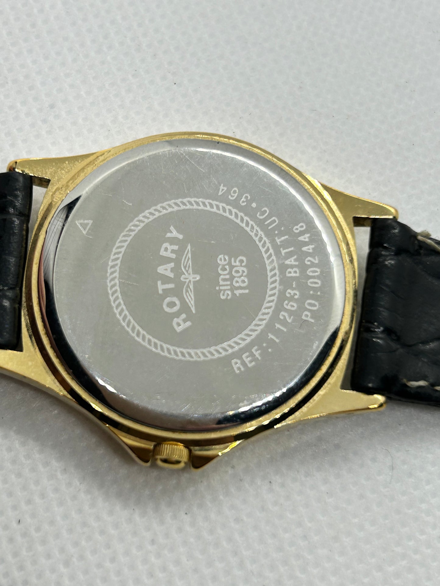 Rotary watch gold dial with day date function