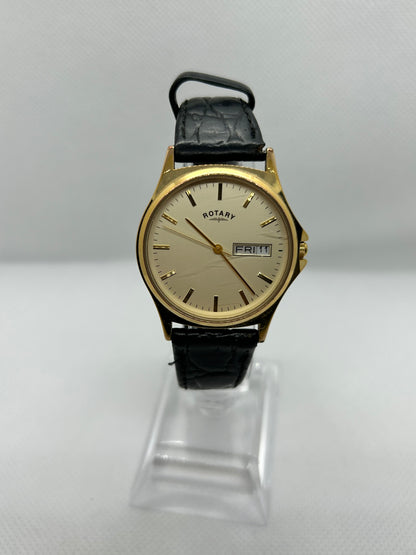 Rotary watch gold dial with day date function