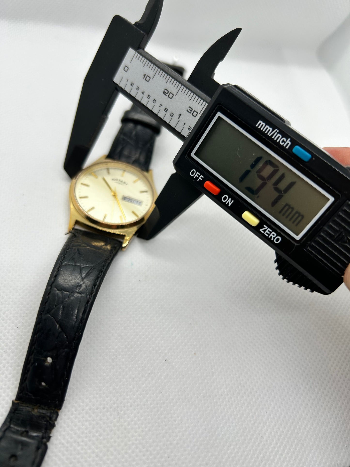 Rotary watch gold dial with day date function