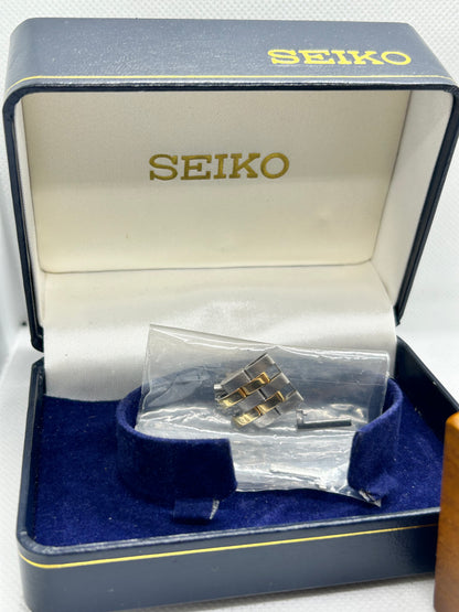 Seiko Daydate SQ100 quartz watch two tone gold and silver with box