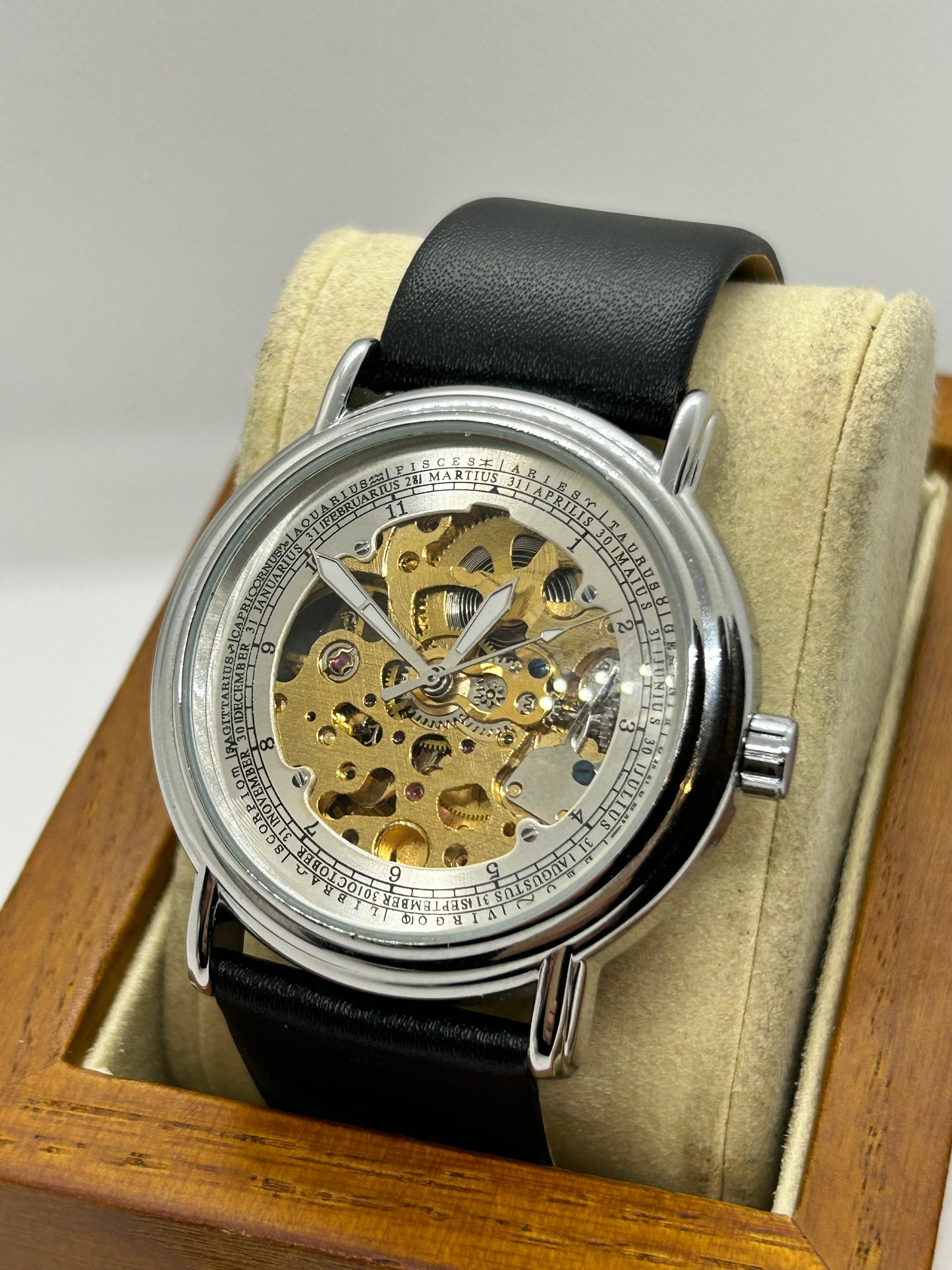 Automatic gents watch with skeleton dial