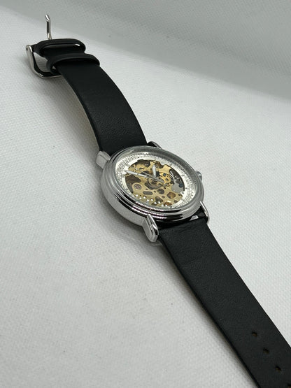 Automatic gents watch with skeleton dial