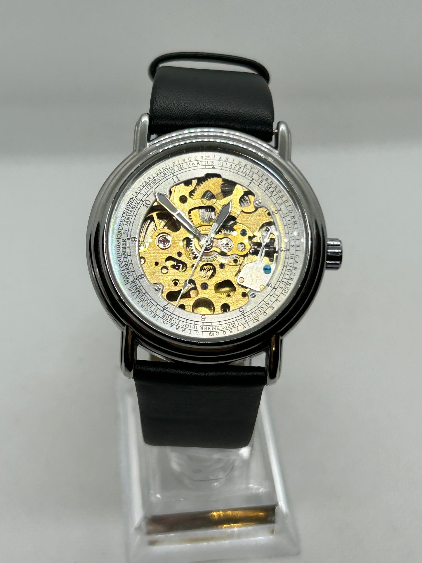 Automatic gents watch with skeleton dial