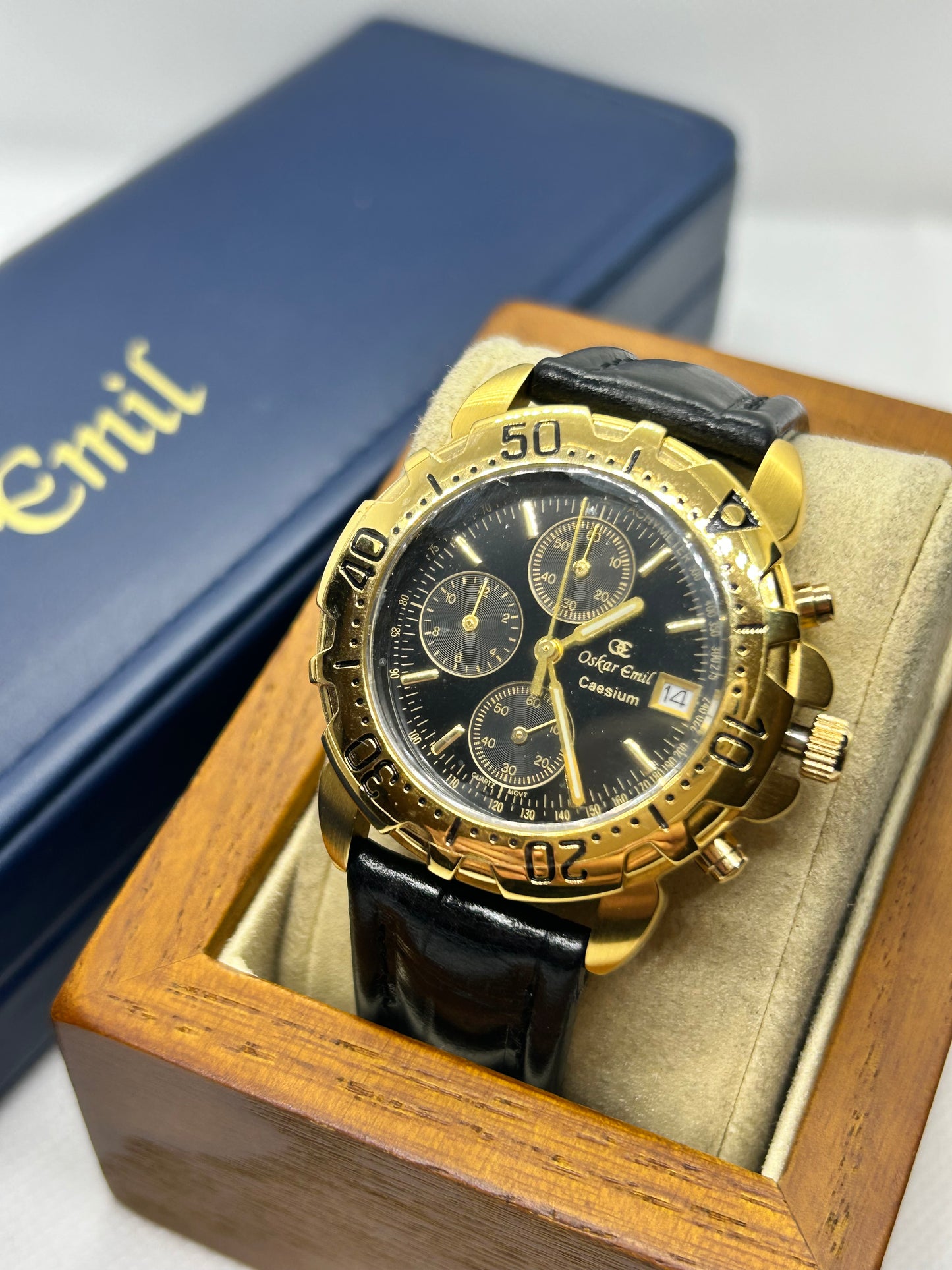 Oskar Emil quartz watch with chronograph function, gold case and black strap