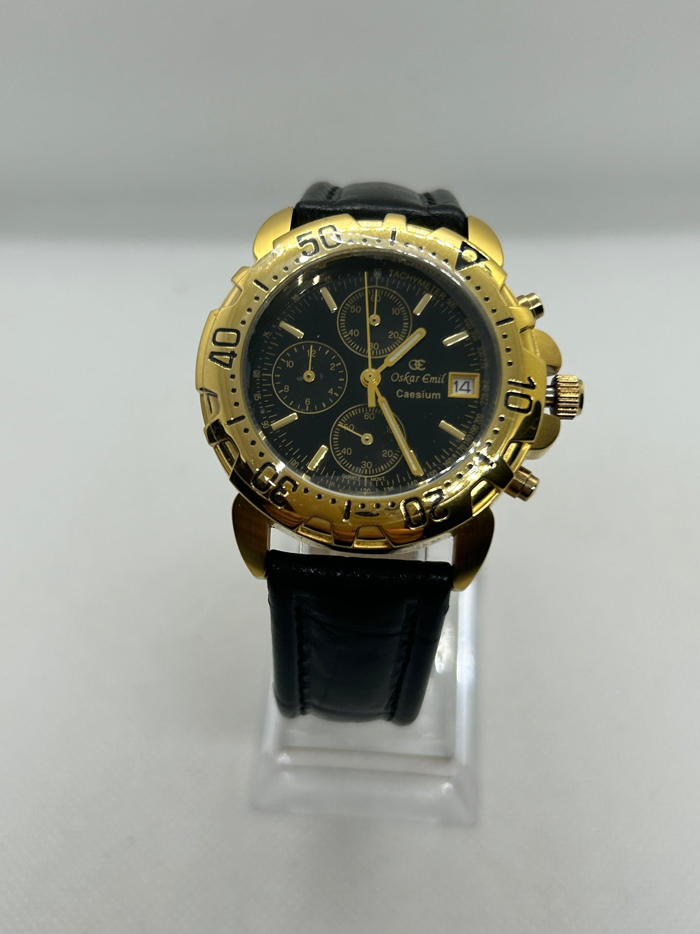 Oskar Emil quartz watch with chronograph function, gold case and black strap