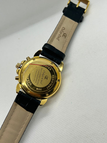 Oskar Emil quartz watch with chronograph function, gold case and black strap