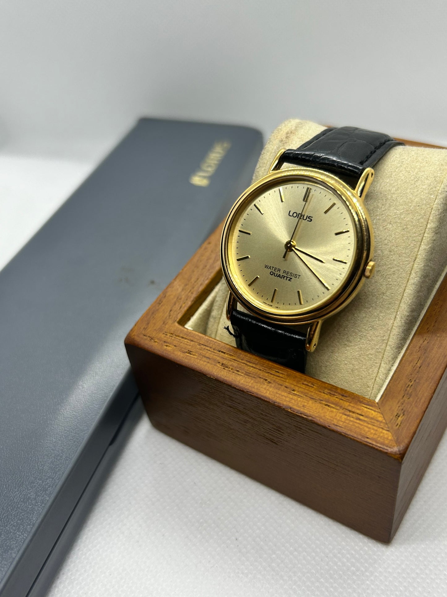 Lorus quartz gold dress watch with engraving on case back, with box