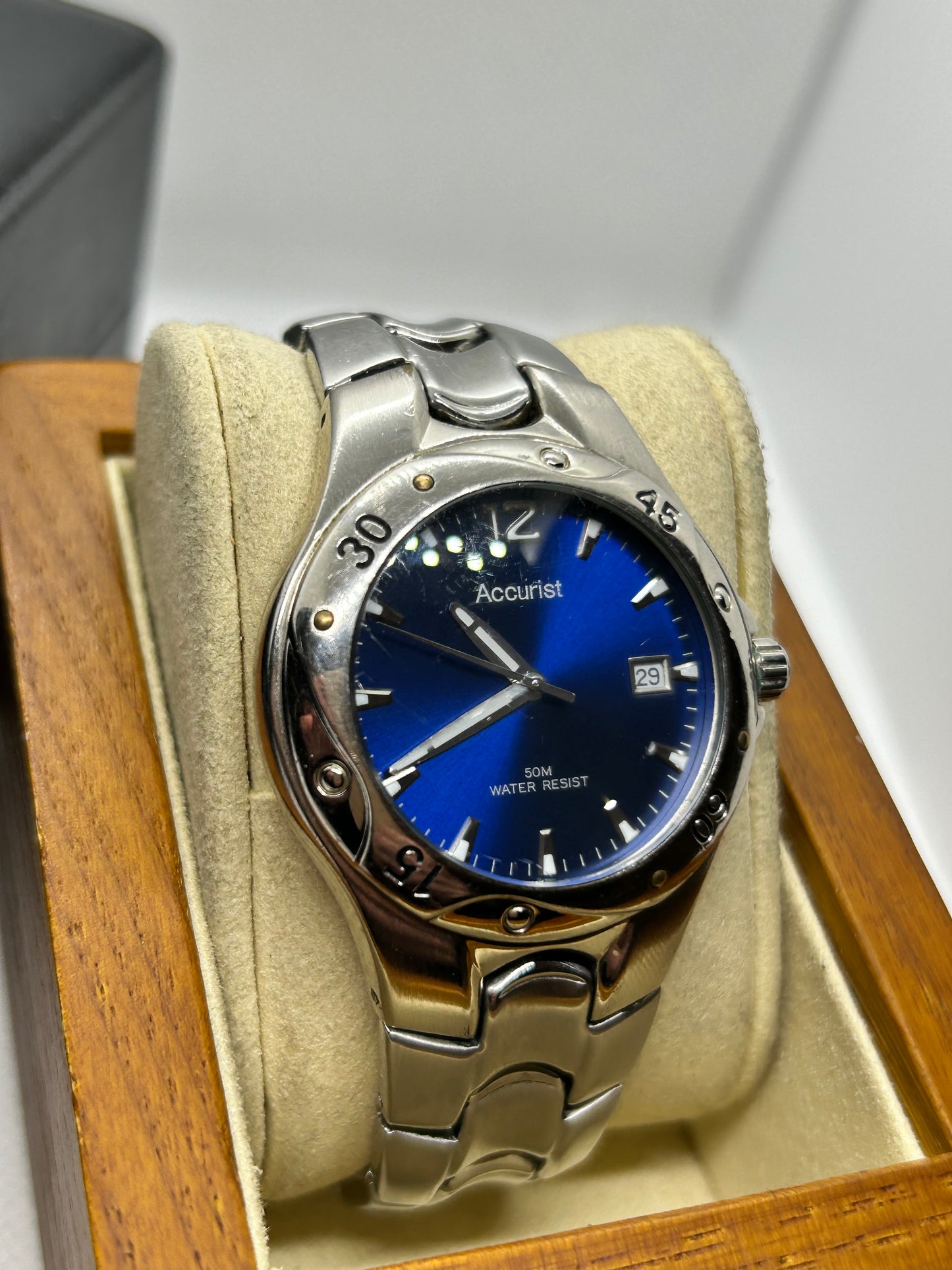 Accurist quartz watch silver case blue dial with date function, with box