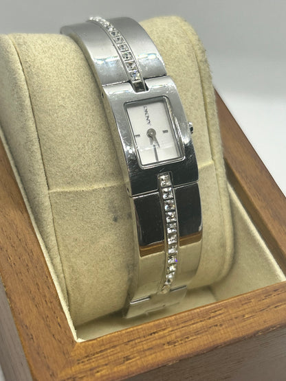 DKNY silver quartz bangle watch with “diamond” style bangle