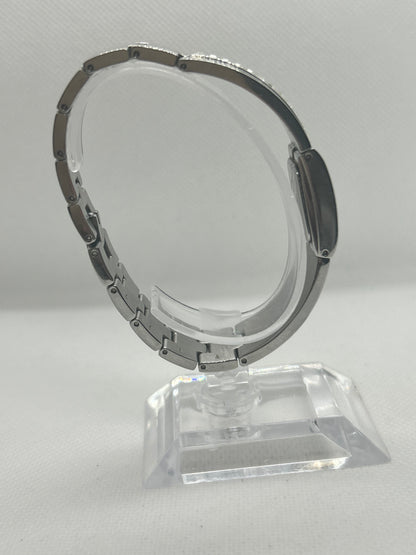 DKNY silver quartz bangle watch with “diamond” style bangle