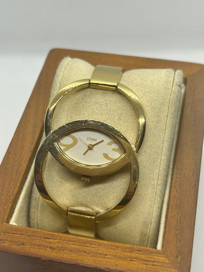 Storm Ladies gold quartz bangle watch