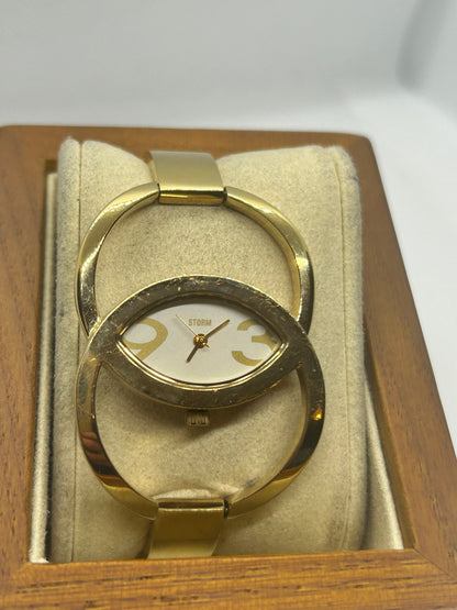 Storm Ladies gold quartz bangle watch