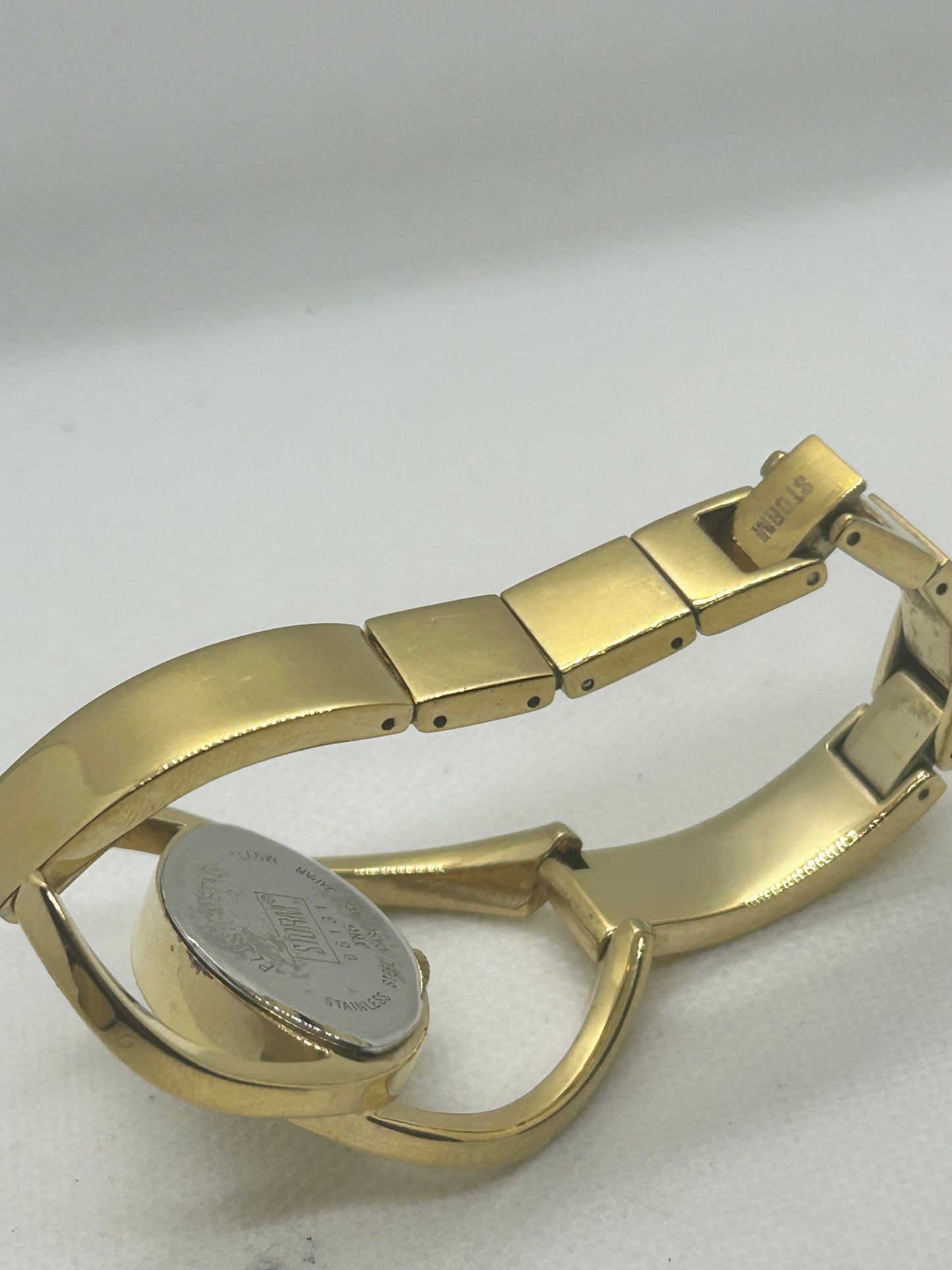 Storm Ladies gold quartz bangle watch