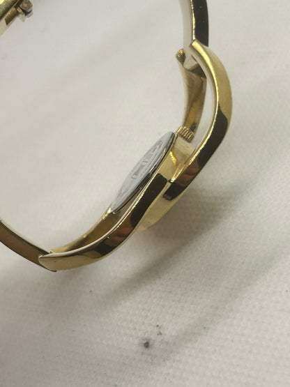 Storm Ladies gold quartz bangle watch