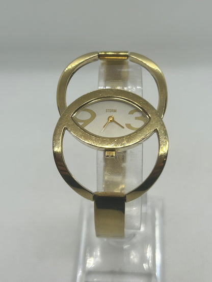 Storm Ladies gold quartz bangle watch