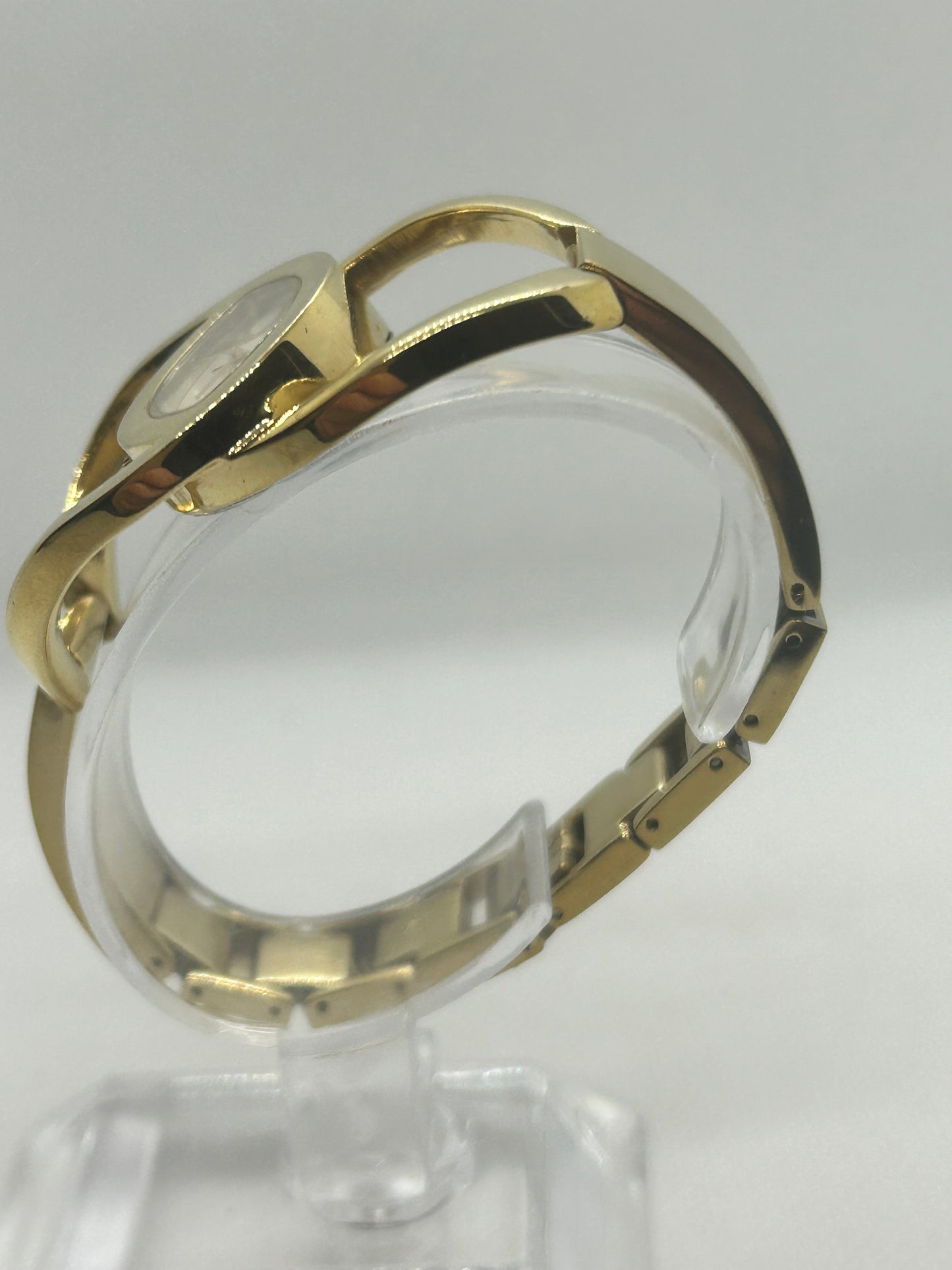 Storm Ladies gold quartz bangle watch