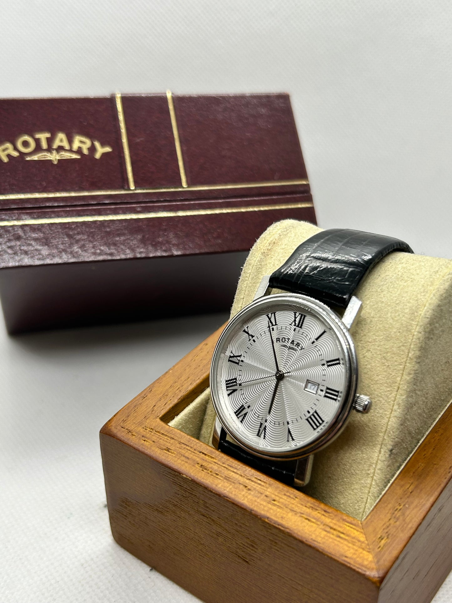 Rotary quartz silver dress watch black strap and date function with box