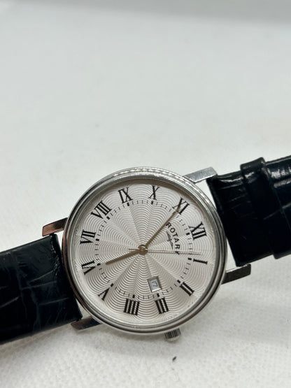 Rotary quartz silver dress watch black strap and date function with box