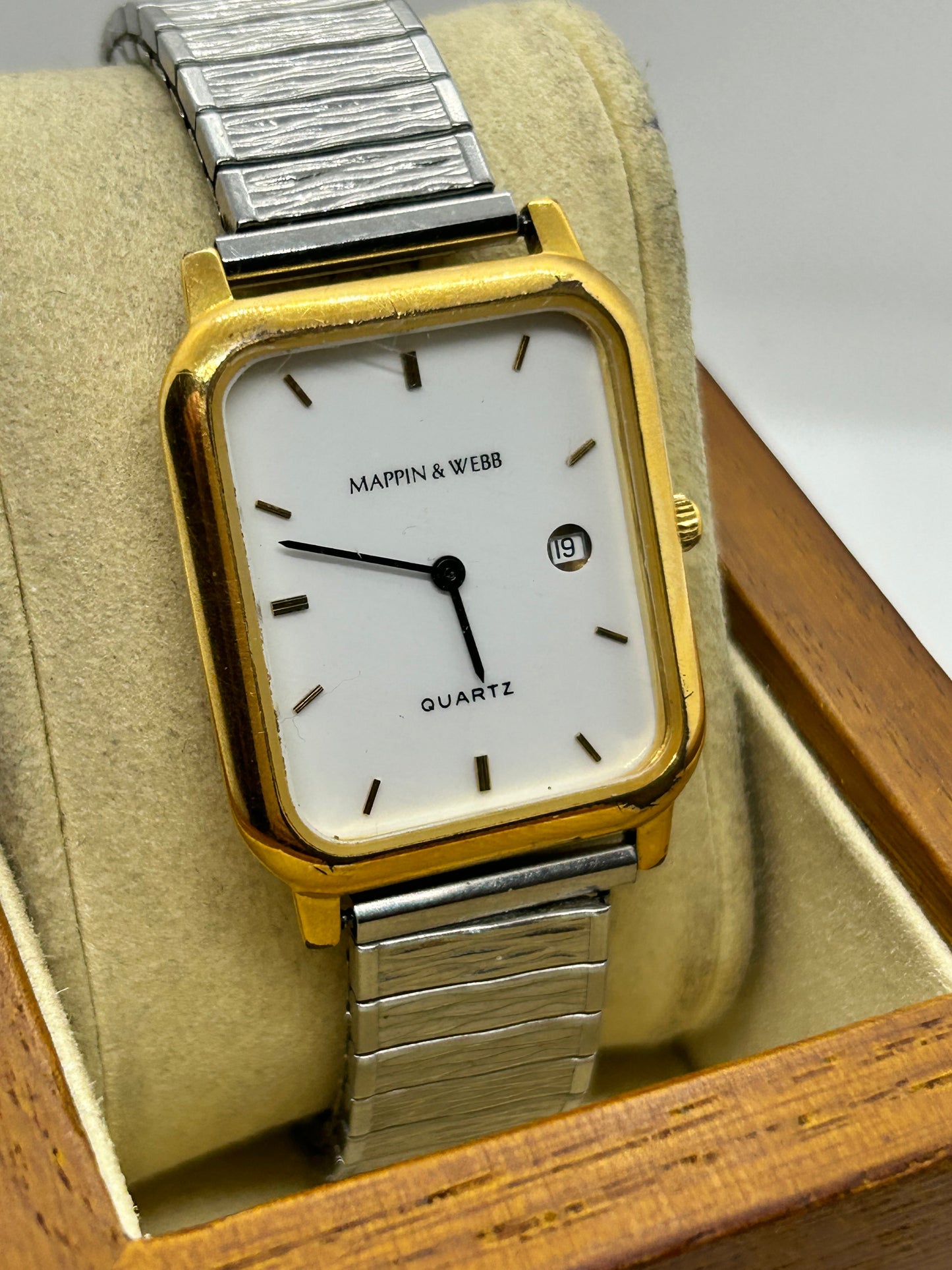 Mappin & Webb quartz watch silver and gold with white dial on stretch bracelet