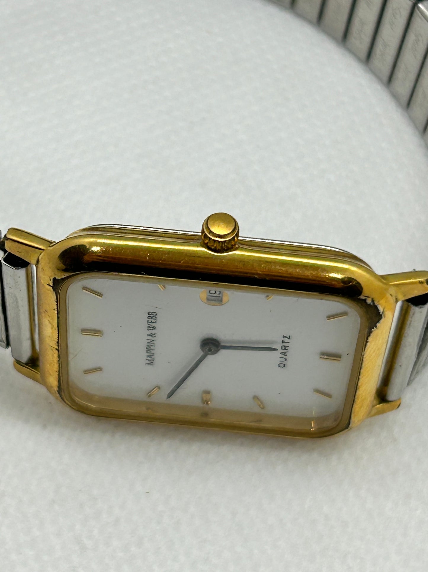 Mappin & Webb quartz watch silver and gold with white dial on stretch bracelet