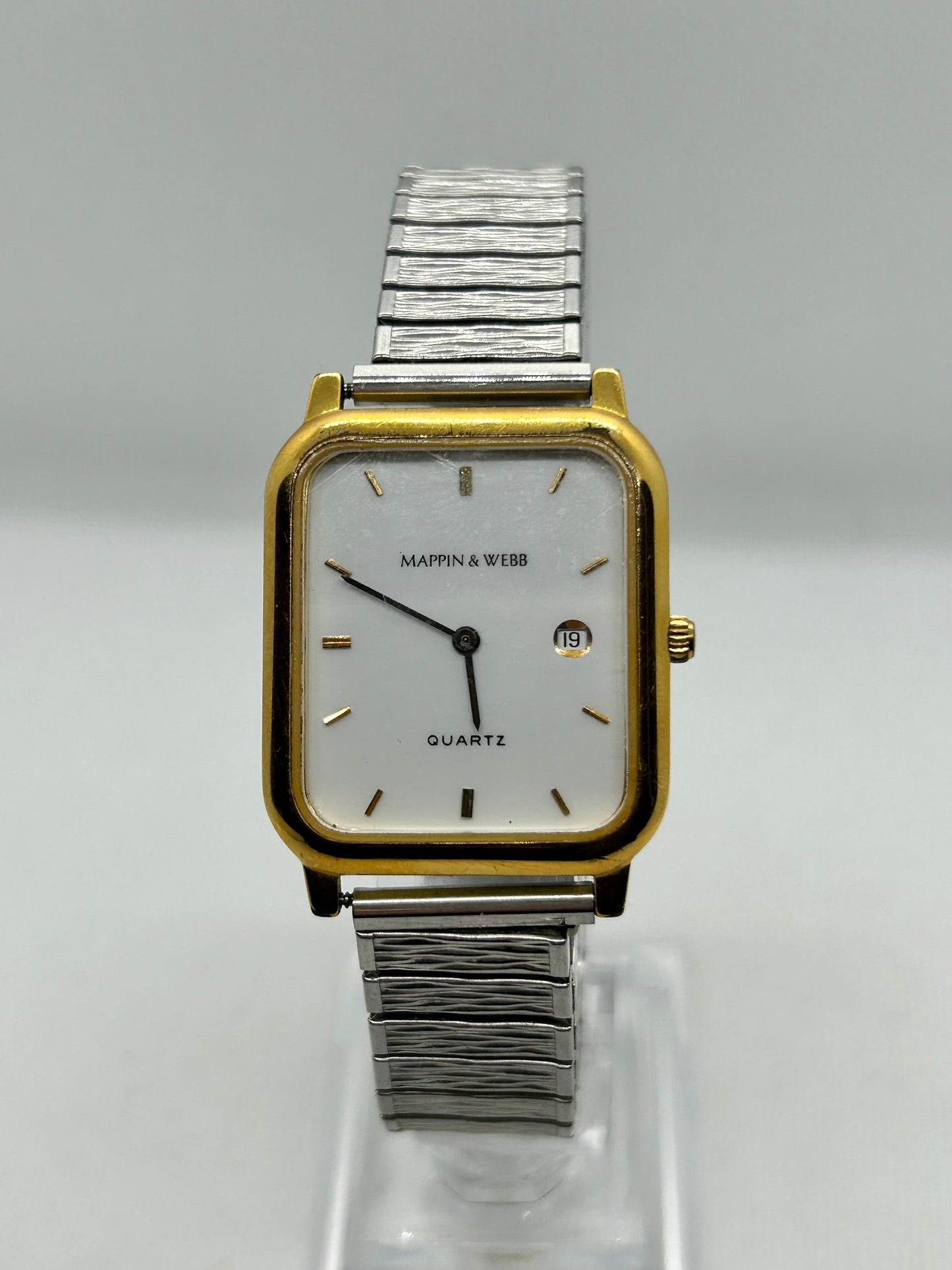 Mappin & Webb quartz watch silver and gold with white dial on stretch bracelet