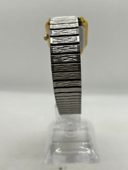 Mappin & Webb quartz watch silver and gold with white dial on stretch bracelet