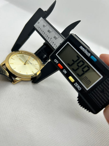 Accurist gold quartz smart dress watch black strap