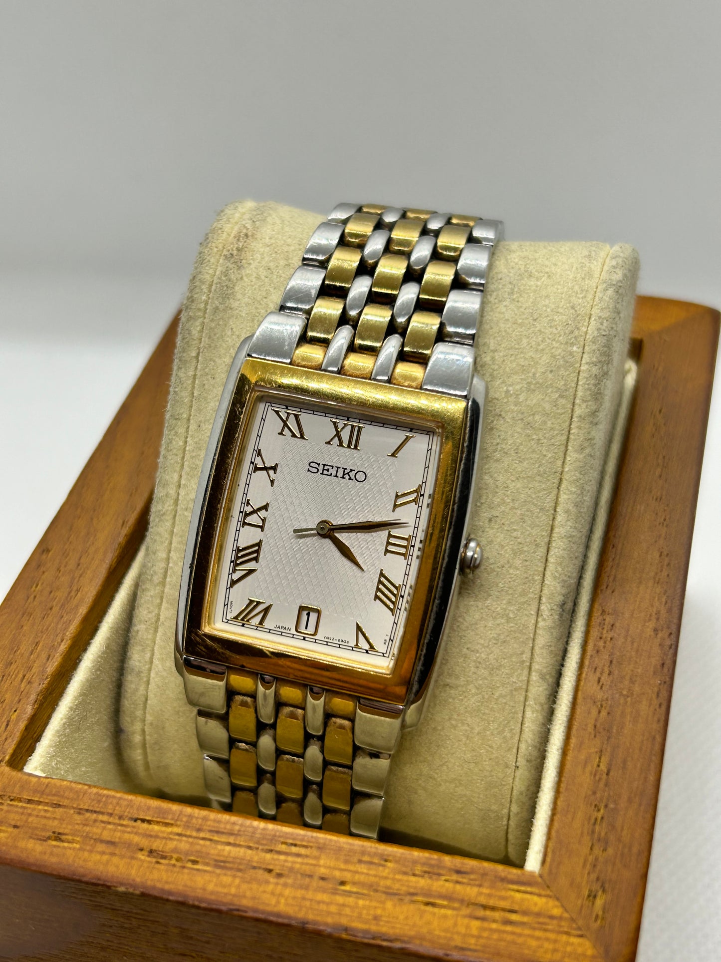 Seiko tank style quartz dress watch two tone silver and gold with date function